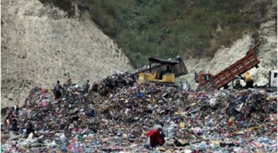 Waste-dumping-in-Sisdol-landfill-site-The-photo-also-shows-scavengers-collecting-the