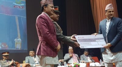 NIC ASIA Bank cheque handover to APF